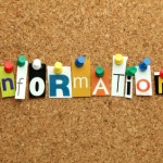The word "Information" pinned on noticeboard in cut out letters